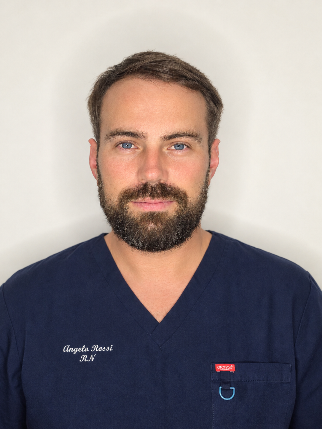 Angelo Rossi, Aesthetic Nurse, in navy clinical scrubs